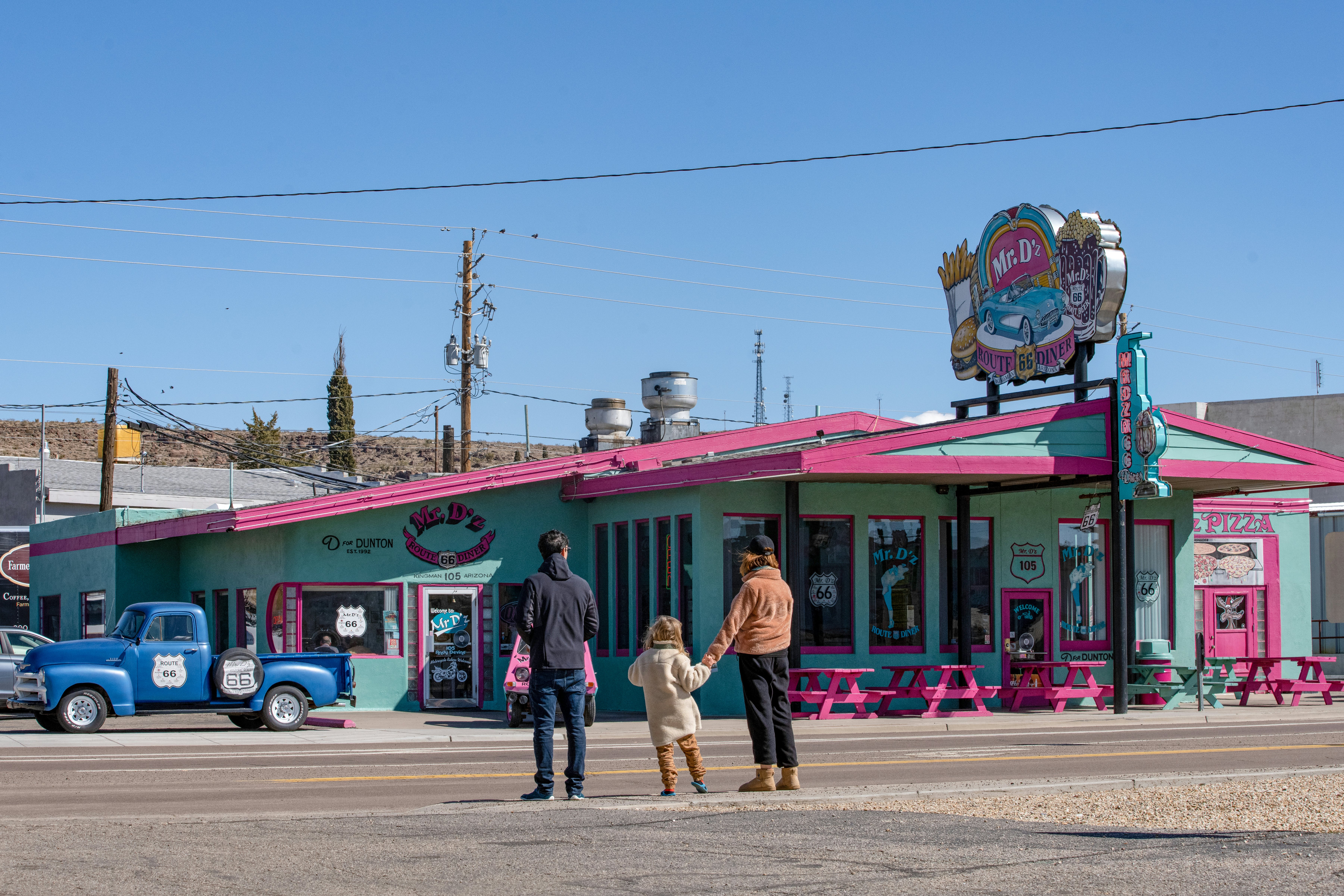 vintage station wagon and Mr D'z Diner on Route 66 in Kingman, Arizona